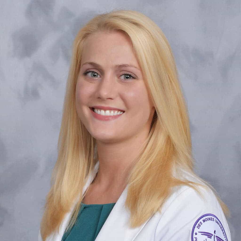 dana successful post bacc student dana wearing white lab coat