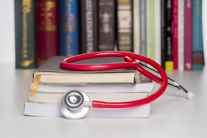 concept of career changing in medical studies concept of medical education with book and stethoscope